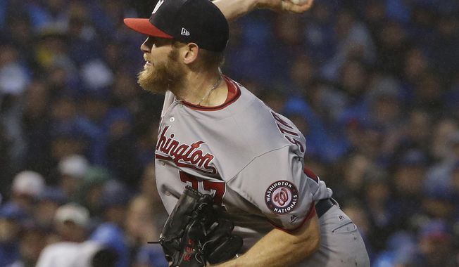 Washington Nationals starting pitcher Stephen Strasburg throws during the seventh inning of Game 4 of baseball&#x27;s National League Division Series against the Chicago Cubs, Wednesday, Oct. 11, 2017, in Chicago. (AP Photo/Nam Y. Huh)