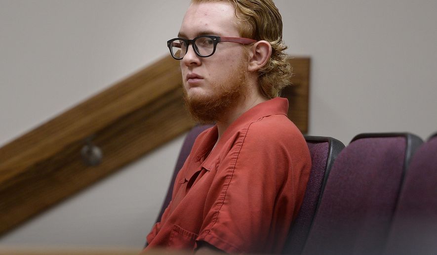 FILE - In this Aug. 23, 2017, file photo, defendant Tyerell Przybycien, of Spanish Fork, waits for the start of his preliminary hearing, in 4th District Court, Provo, Utah. A Utah judge was considering Wednesday, Oct. 11, 2017, whether Przybycien, an 18-year-old accused of filming the suicide of a high school classmate should stand trial for murder after prosecutors said he bought a rope and helped the girl tie a noose before she hanged herself. (Scott Sommerdorf/The Salt Lake Tribune via AP, File)