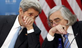 In this May 4, 2016, file photo, Secretary of State John Kerry, left, speaks with Secretary of Energy Ernest Moniz at the State Department in Washington. Former Obama administration officials who played central roles in brokering the Iran nuclear agreement are scheduled to brief congressional Democrats on the merits of the international accord as President Donald Trump prepares to announce a decision that could lead to an unraveling of the pact.  (AP Photo/Alex Brandon)
