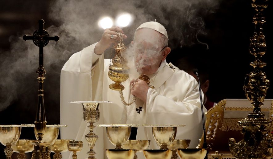 Pope Francis asperses incense as he celebrates Mass on the occasion of the 100th anniversary of the Congregation for the Oriental Churches, at the Saint Mary Major Basilica in Rome, Thursday, Oct. 12, 2017. (AP Photo/Alessandra Tarantino)