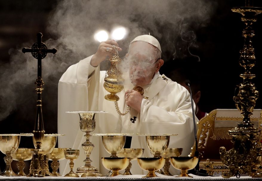 Pope Francis asperses incense as he celebrates Mass on the occasion of the 100th anniversary of the Congregation for the Oriental Churches, at the Saint Mary Major Basilica in Rome, Thursday, Oct. 12, 2017. (AP Photo/Alessandra Tarantino)