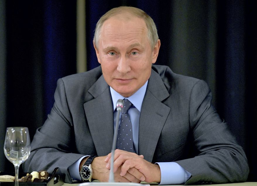 Russia's President Vladimir Putin attends a meeting in Sochi, Russia, Thursday, Oct. 12, 2017. (Alexei Druzhinin, Sputnik, Kremlin Pool Photo via AP) ** FILE **