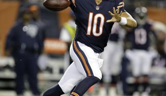 FILe - In this Oct. 9, 2017, file photo, Chicago Bears quarterback Mitchell Trubisky (10) throws during the first half of an NFL football game against the Minnesota Vikings, in Chicago. The Ravens take on the Bears on Sunday in Baltimore.(AP Photo/Darron Cummings, File)