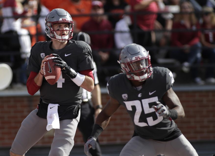 FILE - In this Sept. 16, 2017, file photo, Washington State quarterback Luke Falk (4) looks to pass during an NCAA college football game against Oregon State in Pullman, Wash. After arriving at Washington State as a walk-on, Falk will leave as one of the most productive passers in Pac-12 history. He has thrown for 12,893 yards with 108 touchdowns for his college career, setting school records for career TD passes, passing yardage and total offense. (AP Photo/Young Kwak, File)