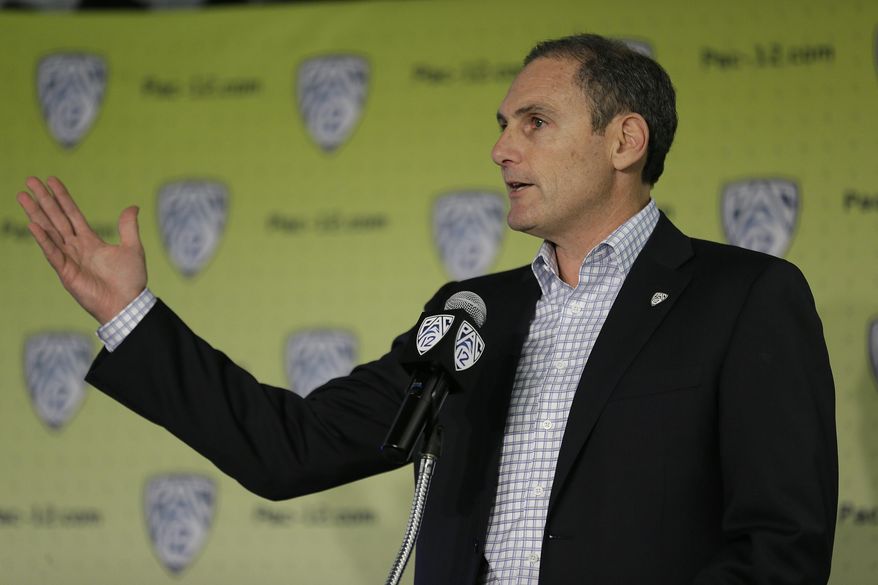 Pac-12 Commissioner Larry Scott speaks during the Pac-12's NCAA college basketball media day, Thursday, Oct. 12, 2017, in San Francisco. (AP Photo/Eric Risberg)