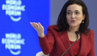 FILE - In this Wednesday, Jan. 18, 2017, file photo, Facebook Chief Operating Officer Sheryl Sandberg speaks during a plenary session during the annual meeting of the World Economic Forum in Davos, Switzerland. Sandberg says the ads linked to Russia trying to influence the U.S. presidential election should “absolutely” be released to the public. In an interview with Axios, Thursday, Oct. 12, 2017, Sandberg also said the company has the responsibility to prevent the kind of abuse that occurred on its platform during the election. (Laurent Gillieron/Keystone via AP, File)