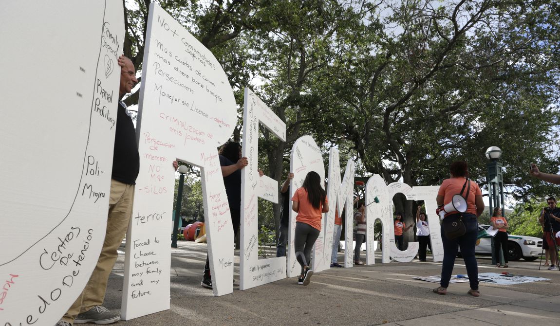 In this file photo, immigrant rights supporters hold giant letters reading &quot;Dream Act&quot; as they demonstrate in favor of Congress passing a &#x27;Clean Dream Act&#x27; that will prevent the deportation of young immigrants known as Dreamers working and studying in the U.S.,Friday, Oct. 13, 2017, in Miami. A decade after President Obama announced the program, DACA recipients are still in legal limbo, Congress remains gridlocked and the border faces unprecedented chaos.  (AP Photo/Lynne Sladky) **FILE**