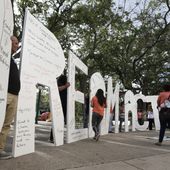 In this file photo, immigrant rights supporters hold giant letters reading &quot;Dream Act&quot; as they demonstrate in favor of Congress passing a &#x27;Clean Dream Act&#x27; that will prevent the deportation of young immigrants known as Dreamers working and studying in the U.S.,Friday, Oct. 13, 2017, in Miami. A decade after President Obama announced the program, DACA recipients are still in legal limbo, Congress remains gridlocked and the border faces unprecedented chaos.  (AP Photo/Lynne Sladky) **FILE**
