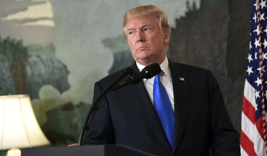 President Donald Trump arrives to speak about Iran from the Diplomatic Reception Room at the White House in Washington on Friday, Oct. 13, 2017. Trump says Iran is not living up to the "spirit" of the nuclear deal that it signed in 2015, and announced a new strategy in the speech. He says the administration will impose additional sanctions on the regime to block its financing of terrorism. (Associated Press) **FILE**