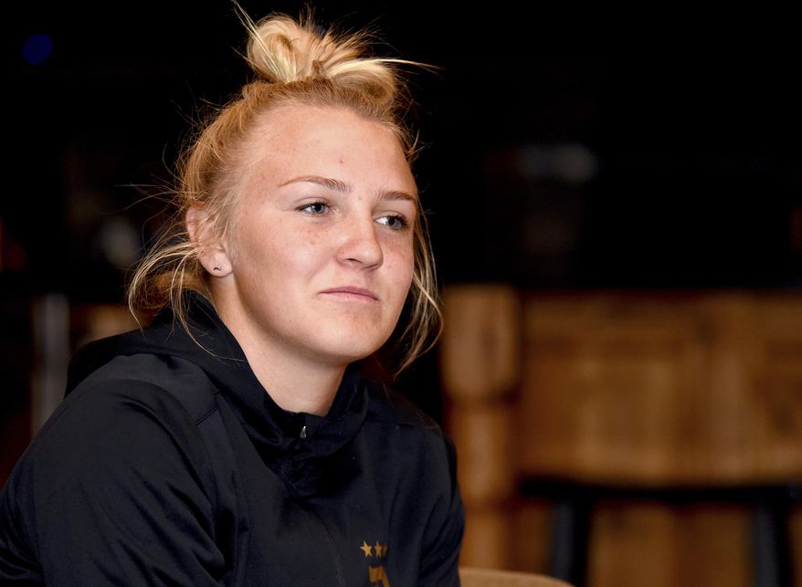 Davis High School girls soccer goalkeeper Halle Moffat a houseboat fire the previous year that severely injured her father Monday, Oct. 2, 2017, at her family home in Kaysville, Utah. (Sarah Welliver/Standard-Examiner via AP)