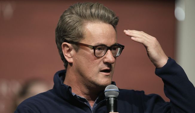 MSNBC television anchor Joe Scarborough takes questions from an audience at a forum at the John F. Kennedy School of Government, on the campus of Harvard University, in Cambridge, Massachusetts, Oct. 11, 2017. (AP Photo/Steven Senne)  ** FILE **