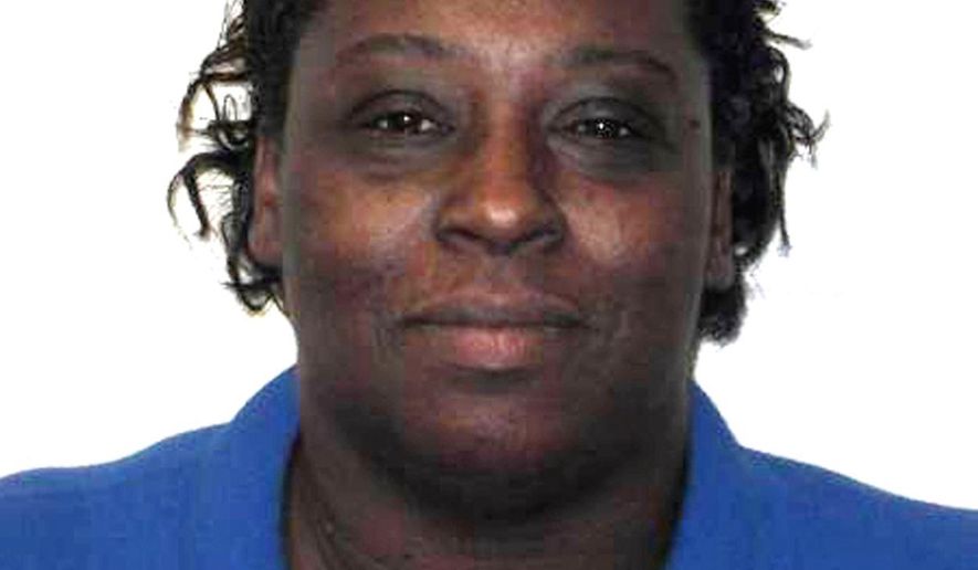 This undated photo made available by the North Carolina Department of Public Safety shows Corrections Enterprises Manager Veronica Darden. Authorities identified Darden as one of two employees killed Thursday, Oct. 12, 2017, during an attempted inmate escape from a North Carolina prison. Darden trained inmates making vests and other embroidered items. (North Carolina Department of Public Safety via AP)