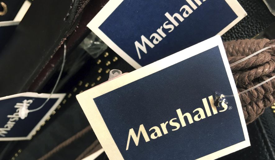 In this Tuesday, May 16, 2017, photo, Marshalls tags are attached to merchandise in a store in Methuen, Mass. On Friday, Oct. 13, 2017, the Commerce Department releases U.S. retail sales data for September. (AP Photo/Elise Amendola)