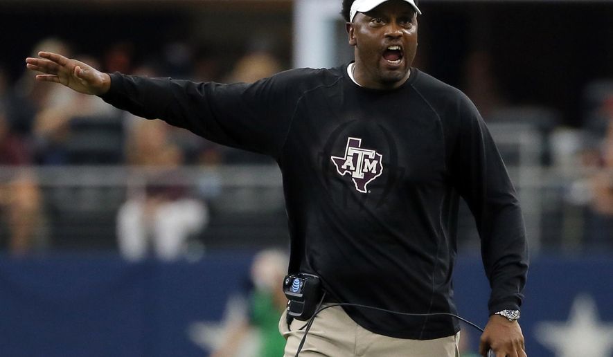 FILE - In this Sept. 23, 2017, file photo, Texas A&M head coach Kevin Sumlin talks to an official, not pictured, after a call during an NCAA college football game against Arkansas, in Arlington, Texas. Florida hosts Texas A&M on Saturday. (AP Photo/Tony Gutierrez, File)