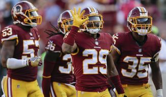 Washington Redskins cornerback Kendall Fuller (29) celebrates his interception in the closing seconds of the second half of an NFL football game against the San Francisco 49ers in Landover, Md., Sunday, Oct. 15, 2017. The Redskins defeated the 49er 26-24. (AP Photo/Mark Tenally) ** FILE **