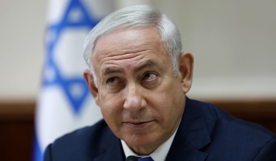 Israeli Prime Minister Benjamin Netanyahu chairs the weekly cabinet meeting at his office in Jerusalem, Sunday, Oct. 15, 2017.  (Abir Sultan/Pool Photo via AP)