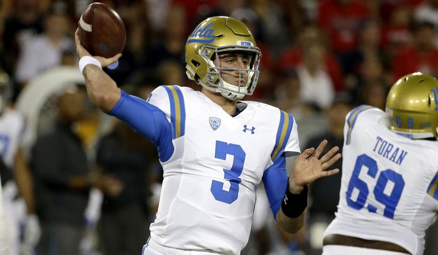 UCLA quarterback Josh Rosen (3) throws down field for a first down against Arizona in the first half during an NCAA college football game, Saturday, Oct. 14, 2017, in Tucson, Ariz. (AP Photo/Rick Scuteri)