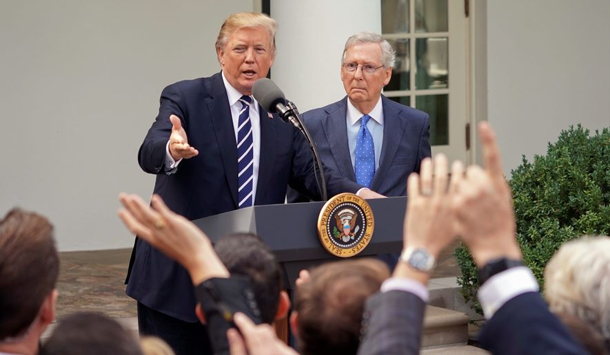 President Trump and Senate Majority Leader Mitch McConnell spoke to members of the media in the Rose Garden of the White House on Monday. (Associated Press)
