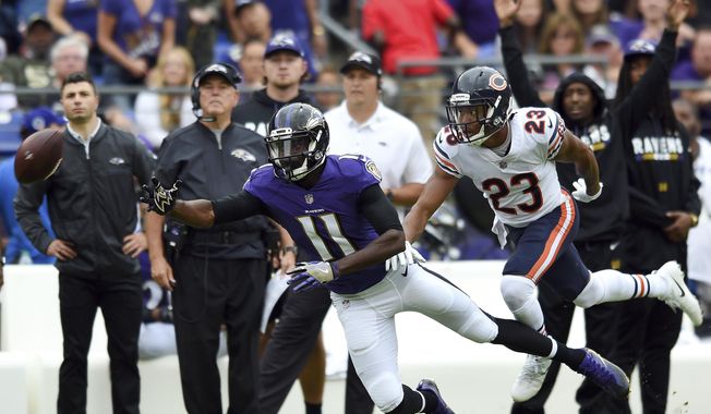 Baltimore Ravens wide receiver Breshad Perriman (11) reaches but is unable to catch a pass as he is pressured by Chicago Bears cornerback Kyle Fuller in the first half of an NFL football game, Sunday, Oct. 15, 2017, in Baltimore. (AP Photo/Gail Burton) **FILE**