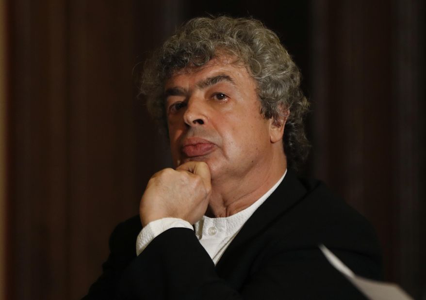 Semyon Bychkov meets with media after being appointed The Czech Philharmonic new chief conductor and music director at the Rudolfinum concert hall in Prague, Czech Republic, Monday, Oct. 16, 2017. (AP Photo/Petr David Josek)