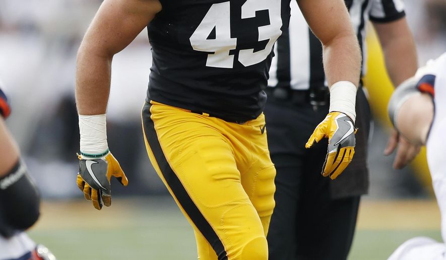 File-This Oct. 7, 2017, file photo shows Iowa linebacker Josey Jewell getting set for a play during the first half of an NCAA college football game against Illinois, Saturday, in Iowa City, Iowa. (AP Photo/Charlie Neibergall)