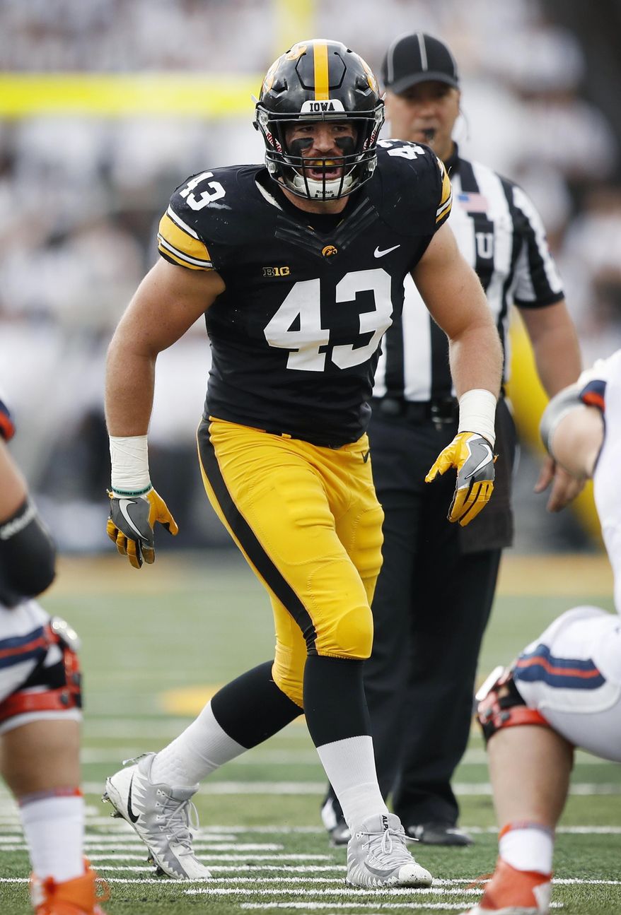 File-This Oct. 7, 2017, file photo shows Iowa linebacker Josey Jewell getting set for a play during the first half of an NCAA college football game against Illinois, Saturday, in Iowa City, Iowa. (AP Photo/Charlie Neibergall)