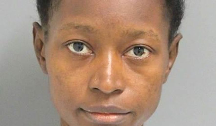 This undated photo provided by the Wilmington Police Department shows Kula Pelima. Police in Delaware's largest city have charged Pelima with drowning her infant son and the baby's 5-year-old half brother. Wilmington Police Chief Robert Tracy said at a news conference Tuesday, Oct. 17, 2017, that officers found the children drowned in a bathtub Monday morning. (Wilmington Police Department via AP)