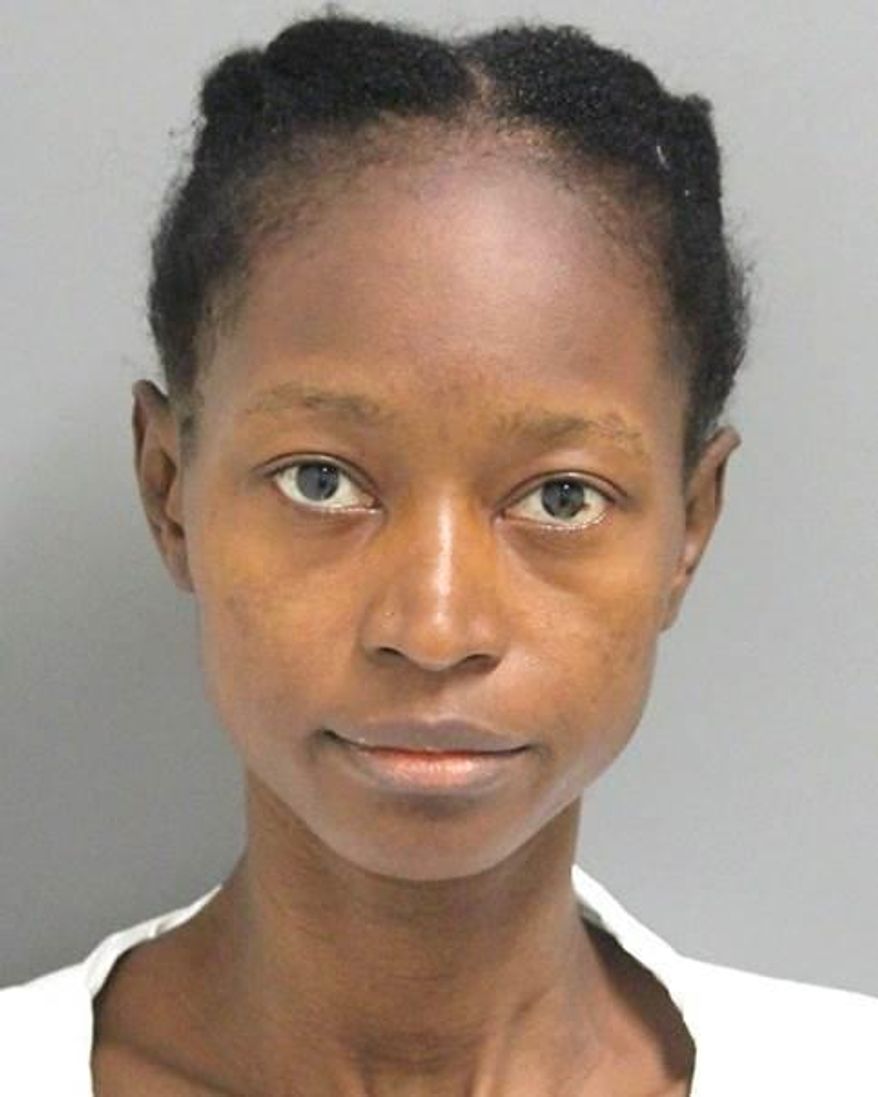 This undated photo provided by the Wilmington Police Department shows Kula Pelima. Police in Delaware's largest city have charged Pelima with drowning her infant son and the baby's 5-year-old half brother. Wilmington Police Chief Robert Tracy said at a news conference Tuesday, Oct. 17, 2017, that officers found the children drowned in a bathtub Monday morning. (Wilmington Police Department via AP)