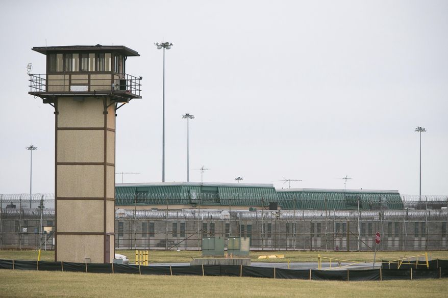 FILE - In this Feb. 1, 2017 file photo, the James T. Vaughn Correctional Center near Smyrna, Del., remains on lockdown following a riot. Delaware has charged 18 inmates in the deadly riot and hostage-taking at the state’s maximum-security prison, most of them on murder charges, according to an indictment that was made public Tuesday, Oct. 17. The riot resulted in the murder of Lieutenant Steven Floyd, injuries to Correctional Officers Winslow Smith and Joshua Wilkinson, and the kidnapping of counselor Patricia May. (Suchat Pederson /The Wilmington News-Journal via AP, File)