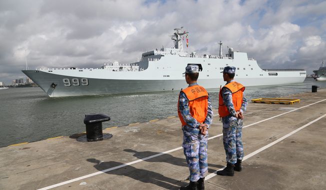 In this Tuesday, July 11, 2017, photo released by China&#x27;s Xinhua News Agency, a ship carrying Chinese military personnel departs a port in Zhanjiang, south China&#x27;s Guangdong Province.  (Wu Dengfeng/Xinhua News Agency via AP) (credit) **FILE**
