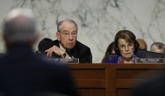 Senate Judiciary Committee Chairman Chuck Grassley, R-Iowa, left, and ranking member Sen. Dianne Feinstein, D-Calif., look to Attorney General Jeff Sessions as he testifies before the Senate Judiciary Committee on Capitol Hill in Washington, Wednesday, Oct. 18, 2017. (AP Photo/Carolyn Kaster)