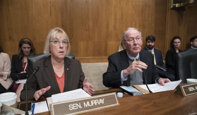 Sen. Patty Murray, D-Wash., the ranking member, and Sen. Lamar Alexander, R-Tenn., chairman of the Senate Health, Education, Labor, and Pensions Committee, meet before the start of a hearing on Capitol Hill in Washington, Wednesday, Oct. 18, 2017. (AP Photo/J. Scott Applewhite) ** FILE **