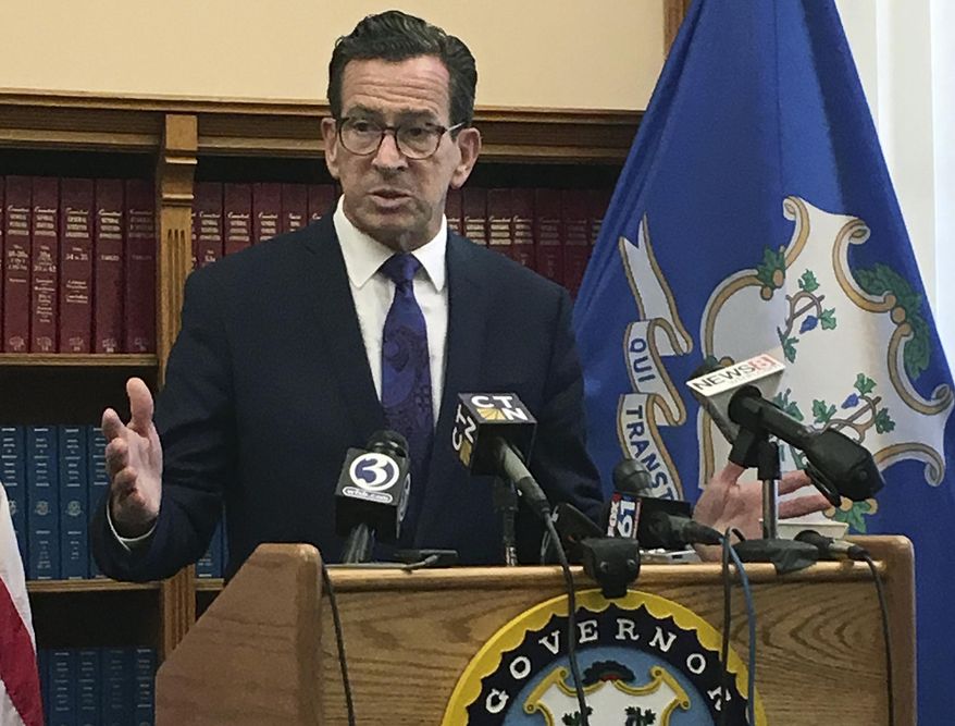 Connecticut Gov. Dannel P. Malloy speaks after top state legislative leaders said they had reached an agreement on a tentative framework for a new two-year budget, Wednesday, Oct. 18, 2017, at the Capitol in Hartford, Conn. (AP Photo/Susan Haigh)