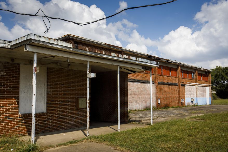 A Monday, Oct. 2, 2017photo shows the former all-black school in the Joppa neighborhood, in Dallas. The property is now owned by Habitat for Humanity, which is trying to determine what to to do with it. (Smiley N. Pool/The Dallas Morning News via AP)