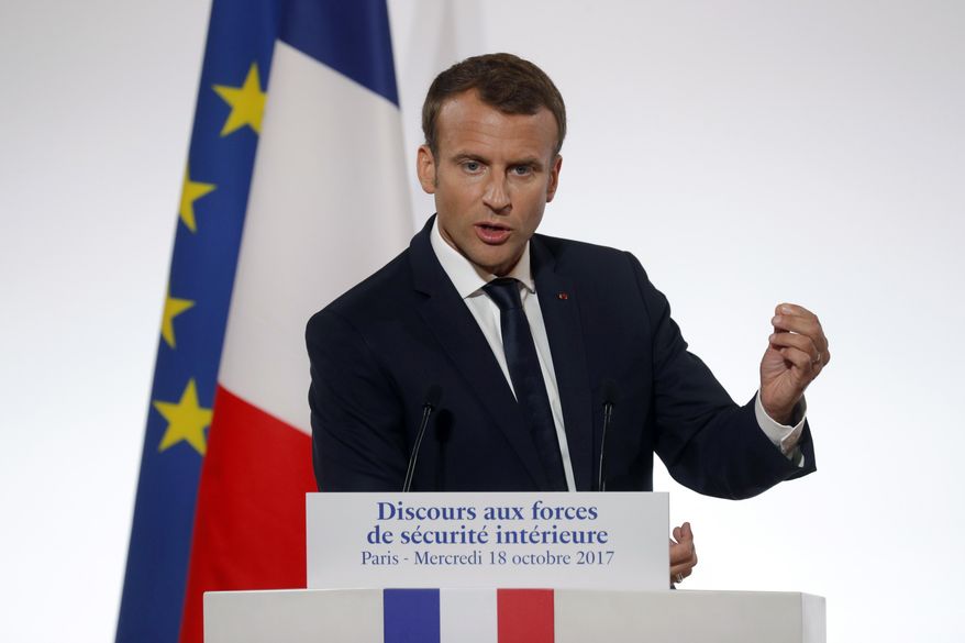 French President Emmanuel Macron delivers a speech on security to representatives of French national police, gendarmes and "Sentinelle" security plan soldiers at the Elysee Palace in Paris, France, Wednesday, Oct. 18, 2017. Macron is expected to launch a new police unit that would focus on daily life especially in working-class neighborhoods. (Philippe Wojazer/Pool Photo via AP)