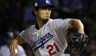 Los Angeles Dodgers starting pitcher Yu Darvish (21) throws during the first inning of Game 3 of baseball&#x27;s National League Championship Series against the Chicago Cubs, Tuesday, Oct. 17, 2017, in Chicago. (AP Photo/Nam Y. Huh)