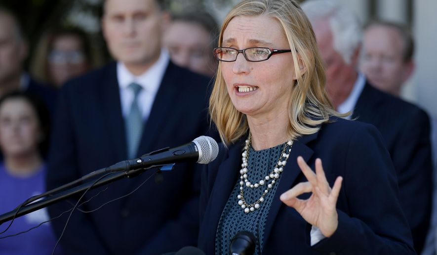 Commissioner Terri White of the Oklahoma Department of Mental Health and Substance Abuse Services speaks at a news conference in Oklahoma City, Wednesday, Oct. 18, 2017. White said the agency will have to eliminate all outpatient services and impose cuts to other programs due to a state budget gap that will force it to cut its budget by $75 million. (AP Photo/Sue Ogrocki)