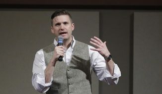 In this Dec. 6, 2016, file photo, Richard Spencer, who leads a movement that mixes racism, white nationalism and populism, speaks at the Texas A&amp;amp;M University campus in College Station, Texas.  (AP Photo/David J. Phillip, File)