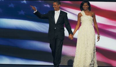 President Barack Obama and First Lady Michelle Obama attend the Neighborhood Inaugural Ball at the Washington Convention Center in Washington, DC. Tuesday, January 20, 2009  (Mary F. Calvert / The Washington Times)