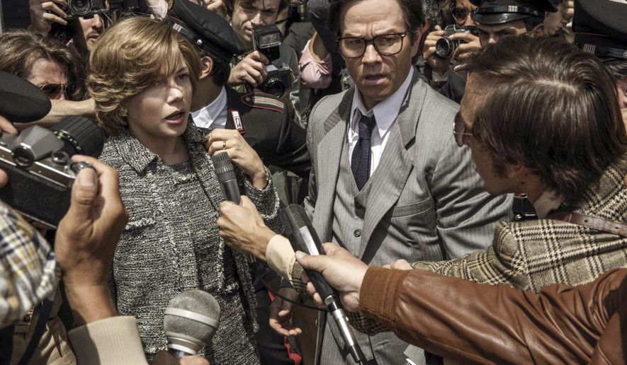 This image released by Sony Pictures shows Michelle Williams, left, and Mark Wahlberg star in TriStar Pictures' "All The Money in the World." Ridley Scott’s film about the kidnapping of John Paul Getty III will have its world premiere as the closing night film of the American Film Institute’s annual festival in Los Angeles next month. (Fabio Lovino/Sony -TriStar Pictures via AP)