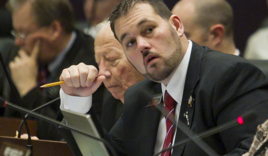 FILE- In this March 7, 2013, file photo, Rep. Brandon A. Hixon, R-Caldwell, looks on at the statehouse in Boise, Idaho. Authorities said Wednesday, Oct. 18, 2017, that Hixon is the subject of a criminal investigation that began two weeks ago. Caldwell police Lt. Joey Hoadley said the investigation involving Hixon has been opened, but he declined to share details about the case and did not say what prompted officers to launch it. (Darin Oswald/Idaho Statesman via AP, File)
