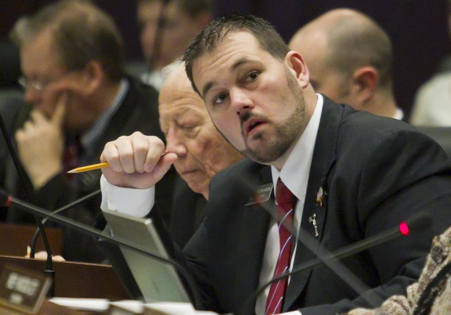 FILE- In this March 7, 2013, file photo, Rep. Brandon A. Hixon, R-Caldwell, looks on at the statehouse in Boise, Idaho. Authorities said Wednesday, Oct. 18, 2017, that Hixon is the subject of a criminal investigation that began two weeks ago. Caldwell police Lt. Joey Hoadley said the investigation involving Hixon has been opened, but he declined to share details about the case and did not say what prompted officers to launch it. (Darin Oswald/Idaho Statesman via AP, File)