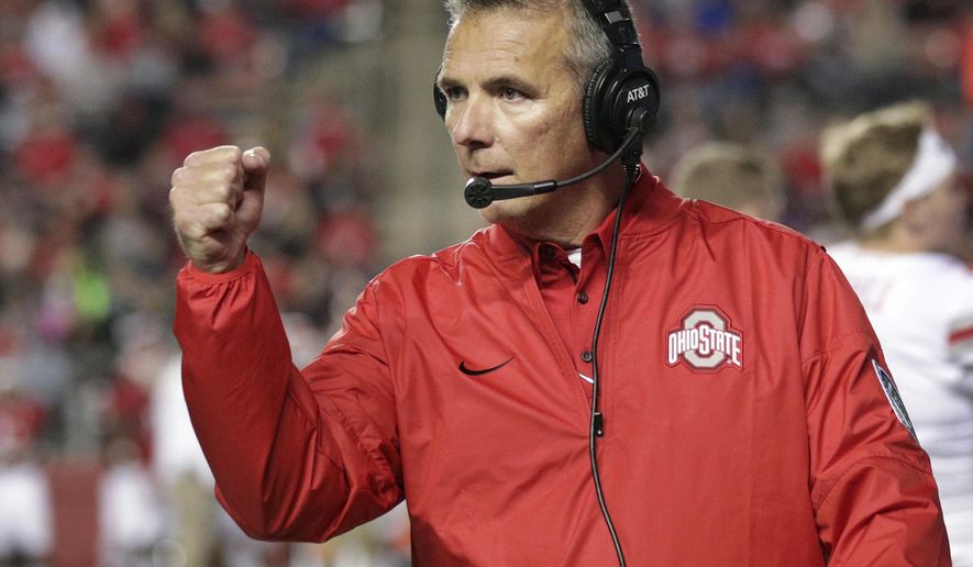 FILE - In this Sept. 30, 2017, file photo, Ohio State head coach Urban Meyer reacts to play during an NCAA college football game against Rutgers in Piscataway, N.J. Meyer says he likes the progress of the Buckeyes’ offense in the past month. He says quarterback J.T. Barrett and the passing game is clicking with Penn State and other tougher games looming after the bye week. (AP Photo/Mel Evans, File)