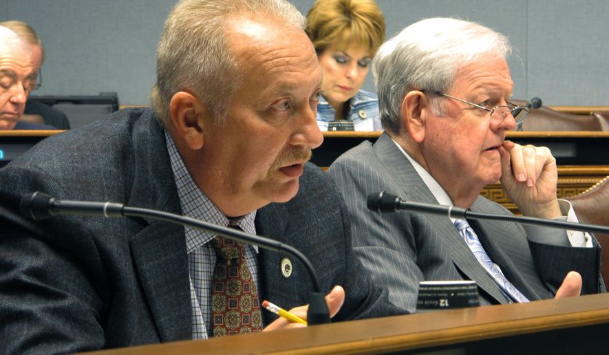 Rep. Jack McFarland, R-Winnfield, asks questions of state health officials about a proposed Medicaid managed-care contract extension during a meeting of the Joint Legislative Committee on the Budget, on Friday, Oct. 20, 2017, in Baton Rouge, La. (AP Photo/Melinda Deslatte)