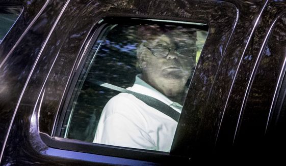 President Donald Trump departs Trump National Golf Club, Sunday, Oct. 22, 2017, in Sterling, Va. (AP Photo/Andrew Harnik)