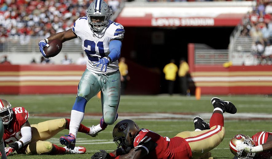 Dallas Cowboys running back Ezekiel Elliott (21) runs against the San Francisco 49ers during the first half of an NFL football game in Santa Clara, Calif., Sunday, Oct. 22, 2017. (AP Photo/Marcio Jose Sanchez)