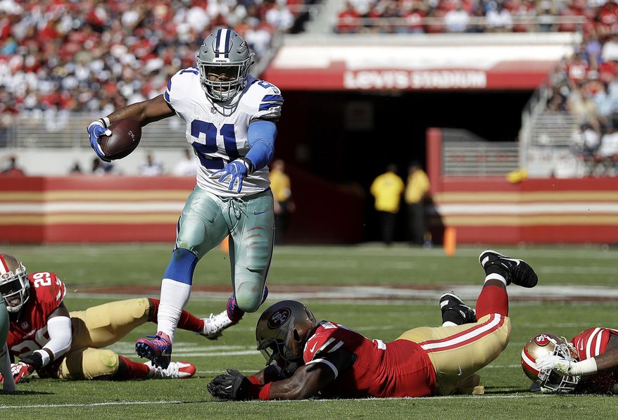Dallas Cowboys running back Ezekiel Elliott (21) runs against the San Francisco 49ers during the first half of an NFL football game in Santa Clara, Calif., Sunday, Oct. 22, 2017. (AP Photo/Marcio Jose Sanchez)