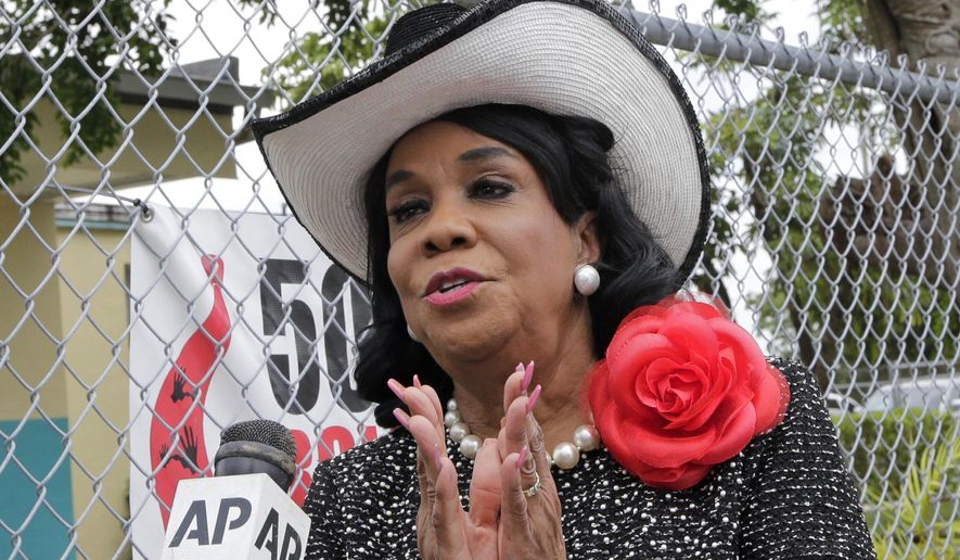 Rep. Frederica Wilson, D-Fla., talks to reporters, Wednesday, Oct. 18, 2017, in Miami Gardens, Fla. Wilson is standing by her statement that President Donald Trump told Myeshia Johnson, the widow of Sgt. La David Johnson killed in an ambush in Niger, that her husband &amp;quot;knew what he signed up for.&amp;quot; In a Wednesday morning tweet, Trump said Wilson&#39;s description of the call was &amp;quot;fabricated.&amp;quot; (AP Photo/Alan Diaz)