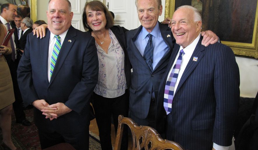 Maryland Gov. Larry Hogan, left, poses with Goody Finkelstein, former Del. Richard Rynd and lobbyist Bruce Bereano after a news conference on Monday, Oct. 23, 2017, in Annapolis after Hogan signed an executive order barring the state from awarding contracts to companies that support boycotts of Israel. (AP Photo/Brian Witte)
