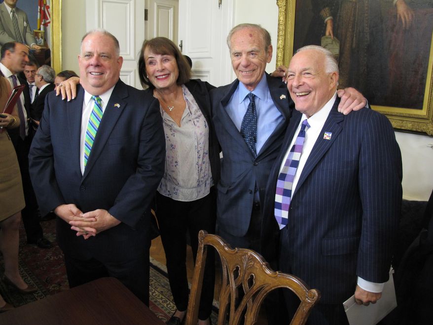 Maryland Gov. Larry Hogan, left, poses with Goody Finkelstein, former Del. Richard Rynd and lobbyist Bruce Bereano after a news conference on Monday, Oct. 23, 2017, in Annapolis after Hogan signed an executive order barring the state from awarding contracts to companies that support boycotts of Israel. (AP Photo/Brian Witte)